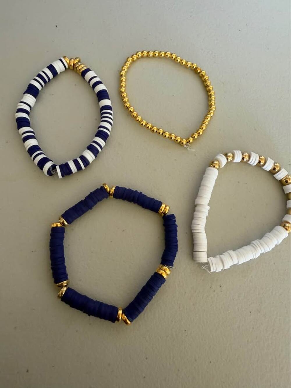 Set of 4 Navy, White, and Gold Beaded Bracelets